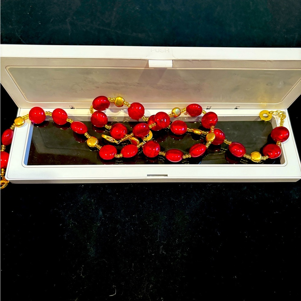 Elegant Red and Gold Beaded Necklace and bracelet. 
Made in Italy.